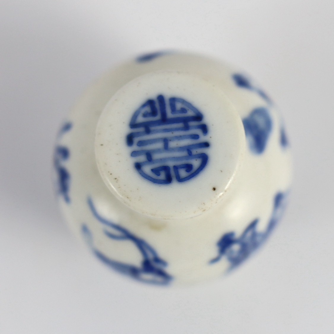 A Chinese blue and white 'scholars' snuff bottle and original stopper, 19th century, 5.8 cm high